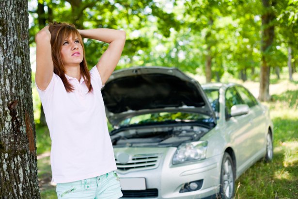 Girl Feeling Stressed When Car Broke Down In A Jungle