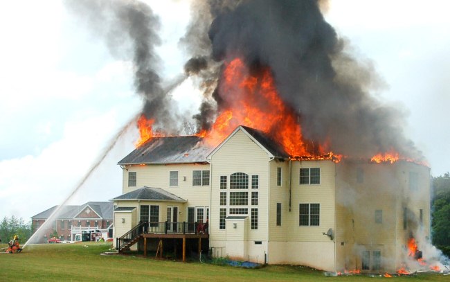 House On Fire - Firemen Working