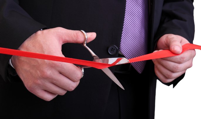 Starting Business Online-Businessman-Cutting-Ribbon